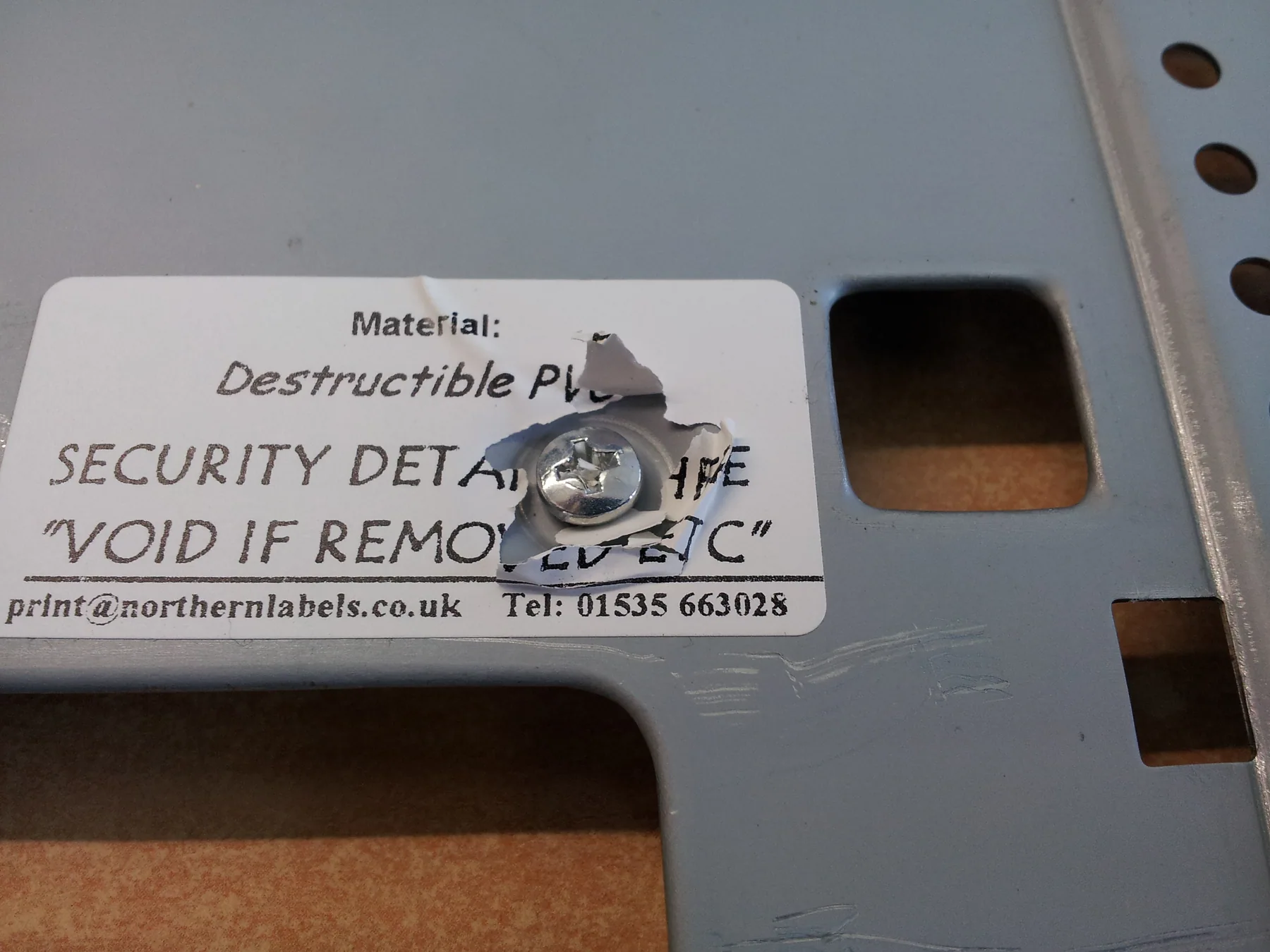 Real screw cover security label